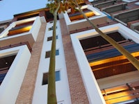 a tall building with a balcony