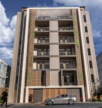 a rendering of an apartment building with a car parked in front of it